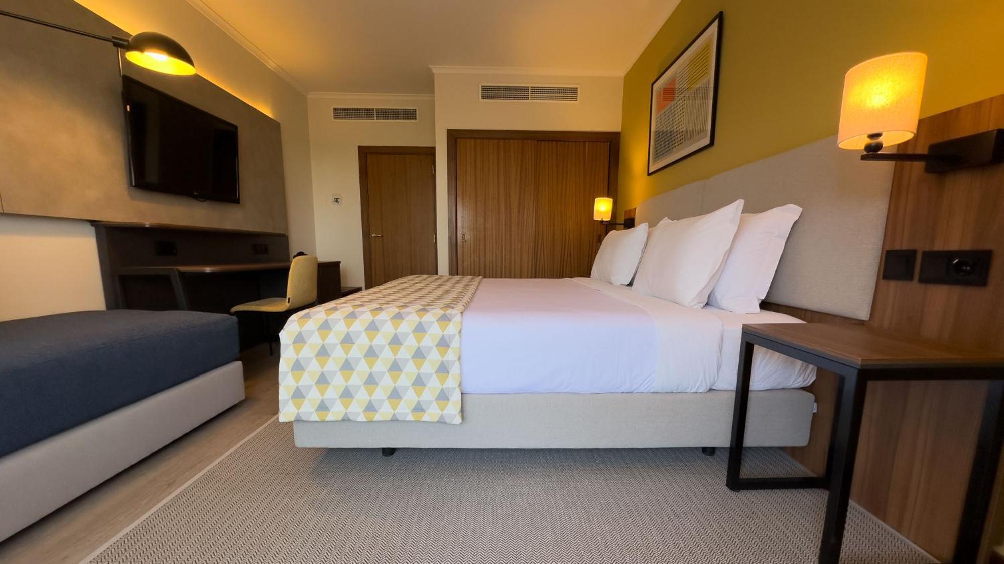 Standard Double Room with Furnished Balcony and Single Sofa Bed,1661631269:JPEG